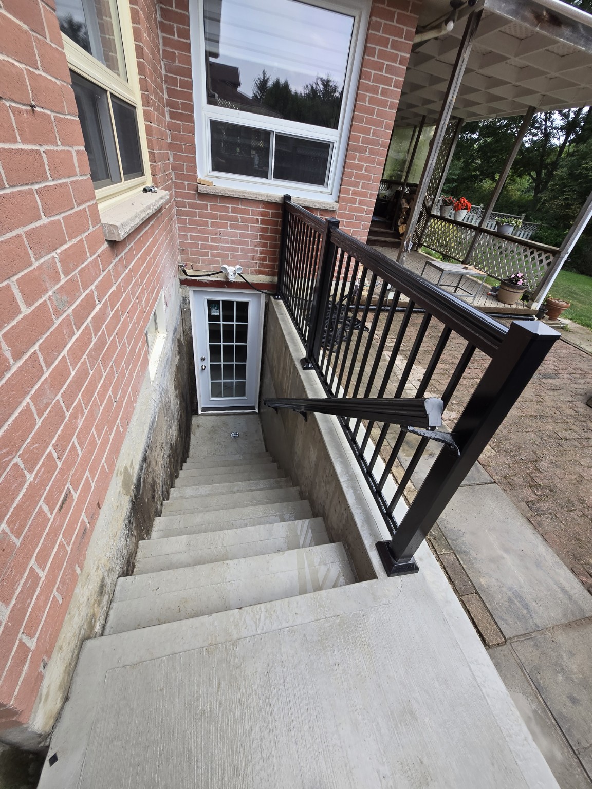 Exterior basement entrance and stairs